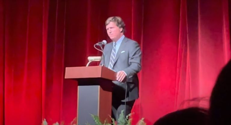 WATCH: Tucker Carlson Makes First Appearance Since Fox News Departure, Gets Standing Ovation